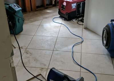 Kitchen undergoing water damage restoration.