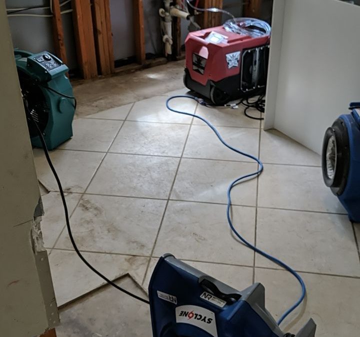 Kitchen undergoing water damage restoration.